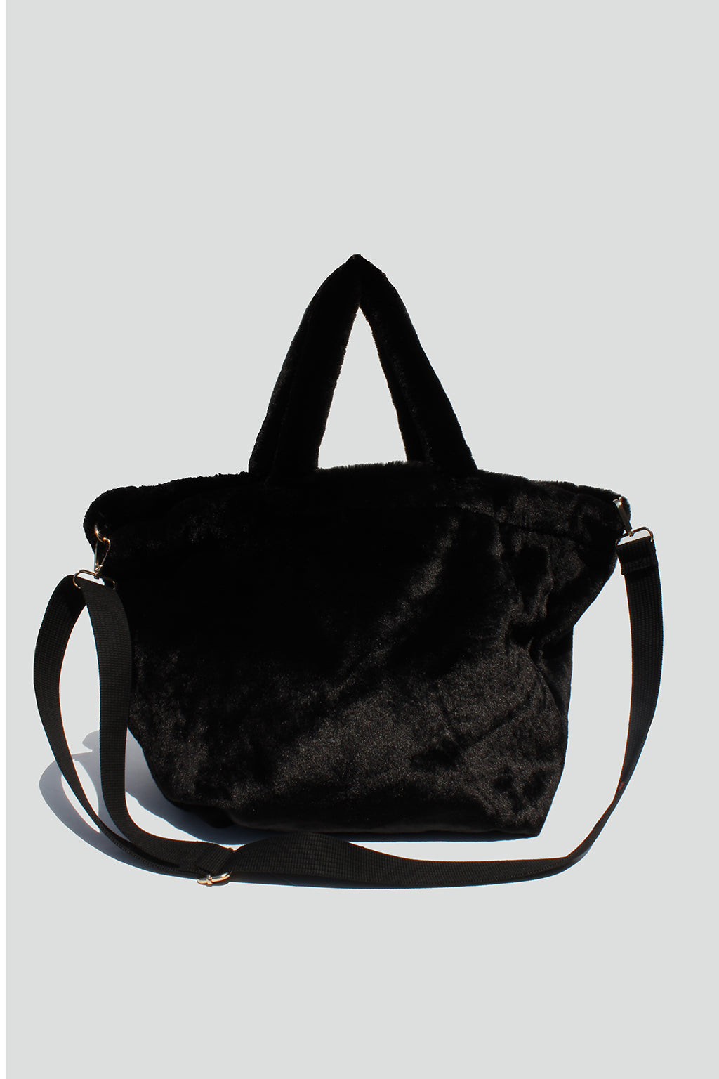 Black faux fashion fur bag